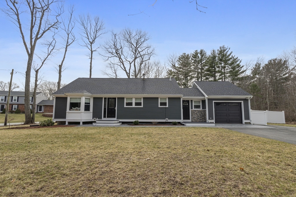 27 Leo's Lane Avon, MA 02322 - Photo 26 of 30 a house that has a tree in front of it