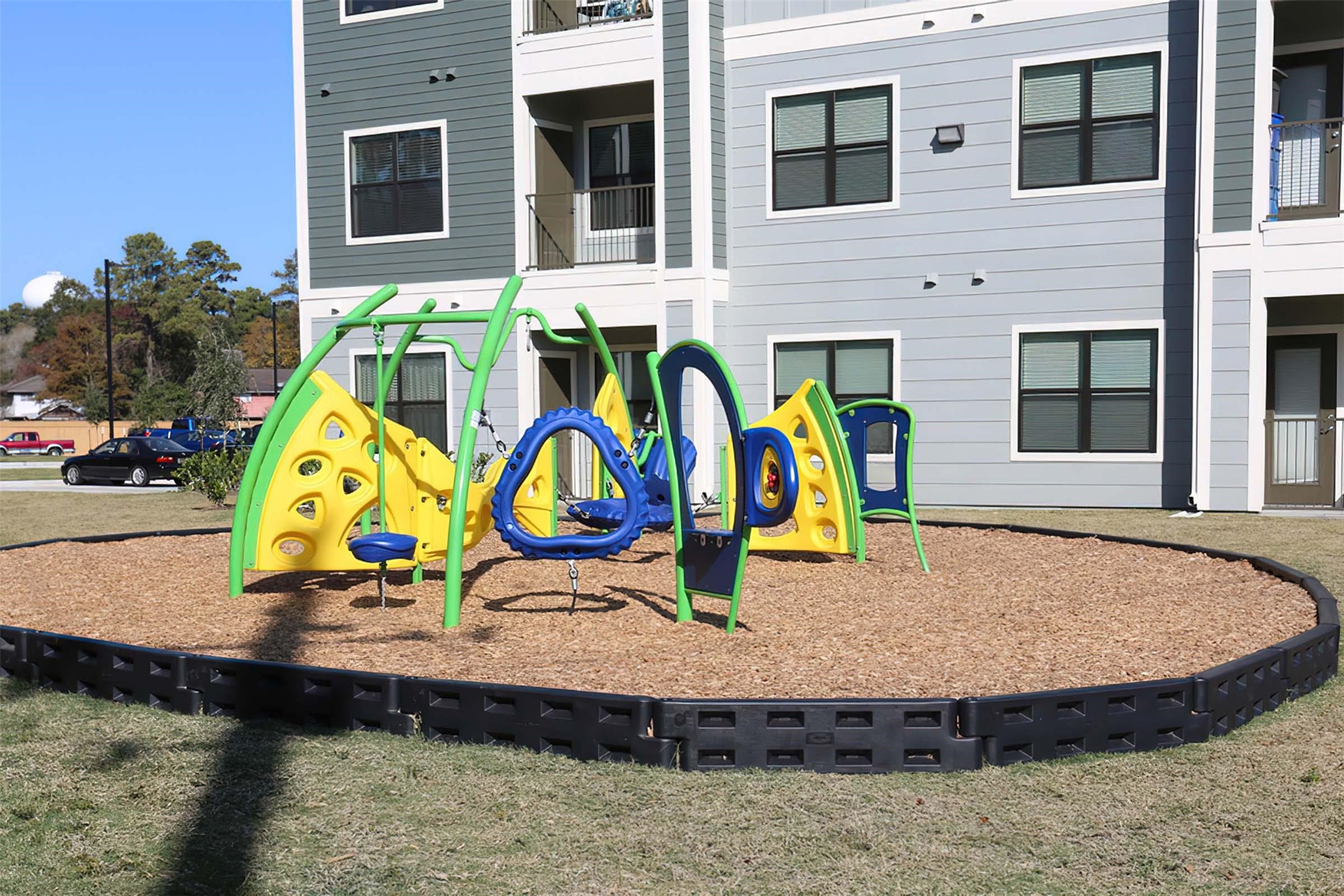 4604 Cypresswood Drive, Unit 3209 Spring, TX 77379 - Photo 24 of 29 a view of a park with slide