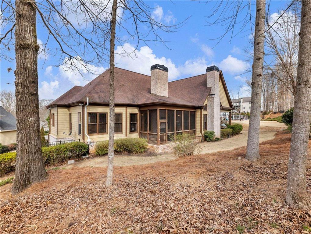 6147 Golf View Court Jefferson, GA 30549 - Photo 63 of 73 a front view of a house with garden