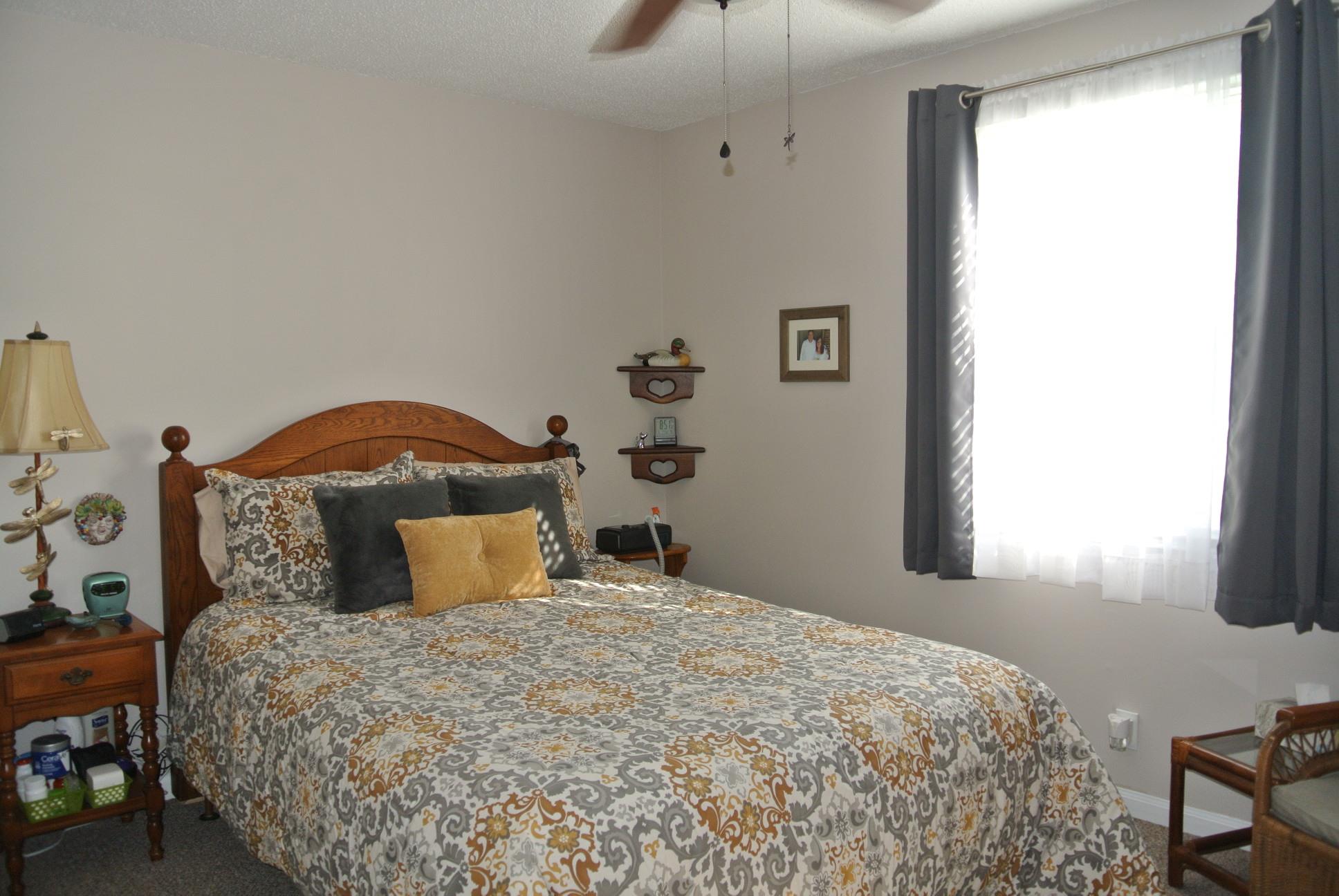 308 Dean Road Clarksville, TN 37040 - Photo 7 of 18 a bedroom with a bed and a window
