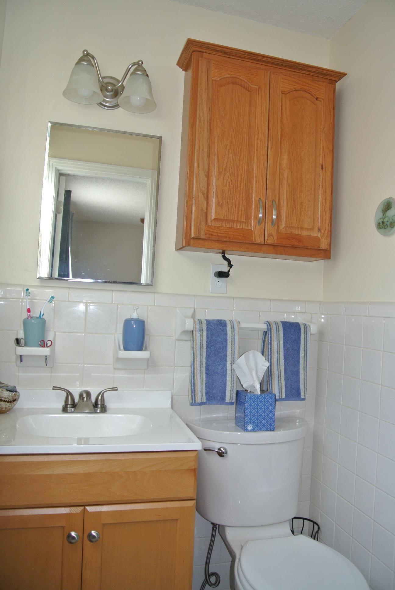 308 Dean Road Clarksville, TN 37040 - Photo 8 of 18 a bathroom with a toilet a sink and mirror