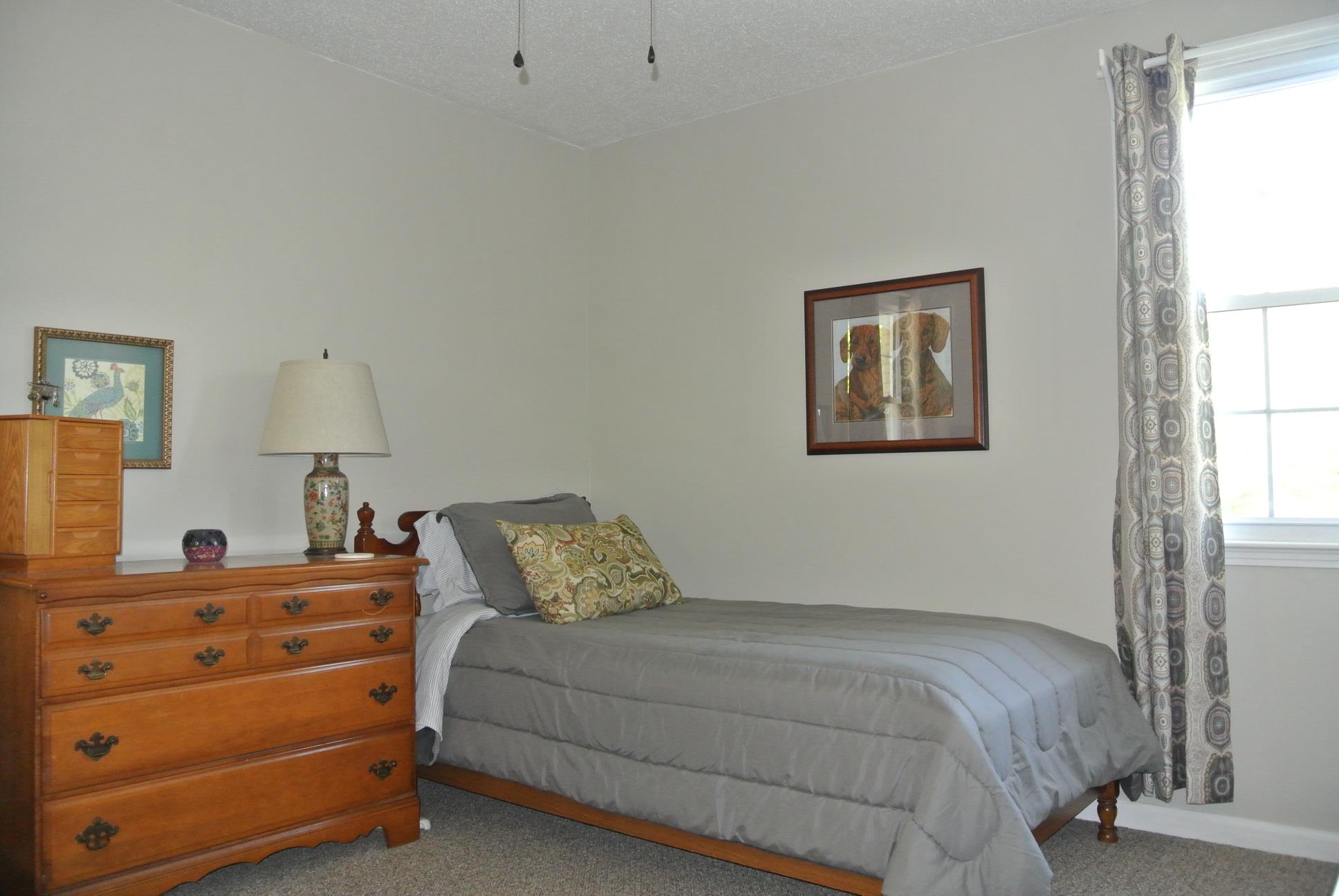 308 Dean Road Clarksville, TN 37040 - Photo 9 of 18 a bedroom with a bed and a window