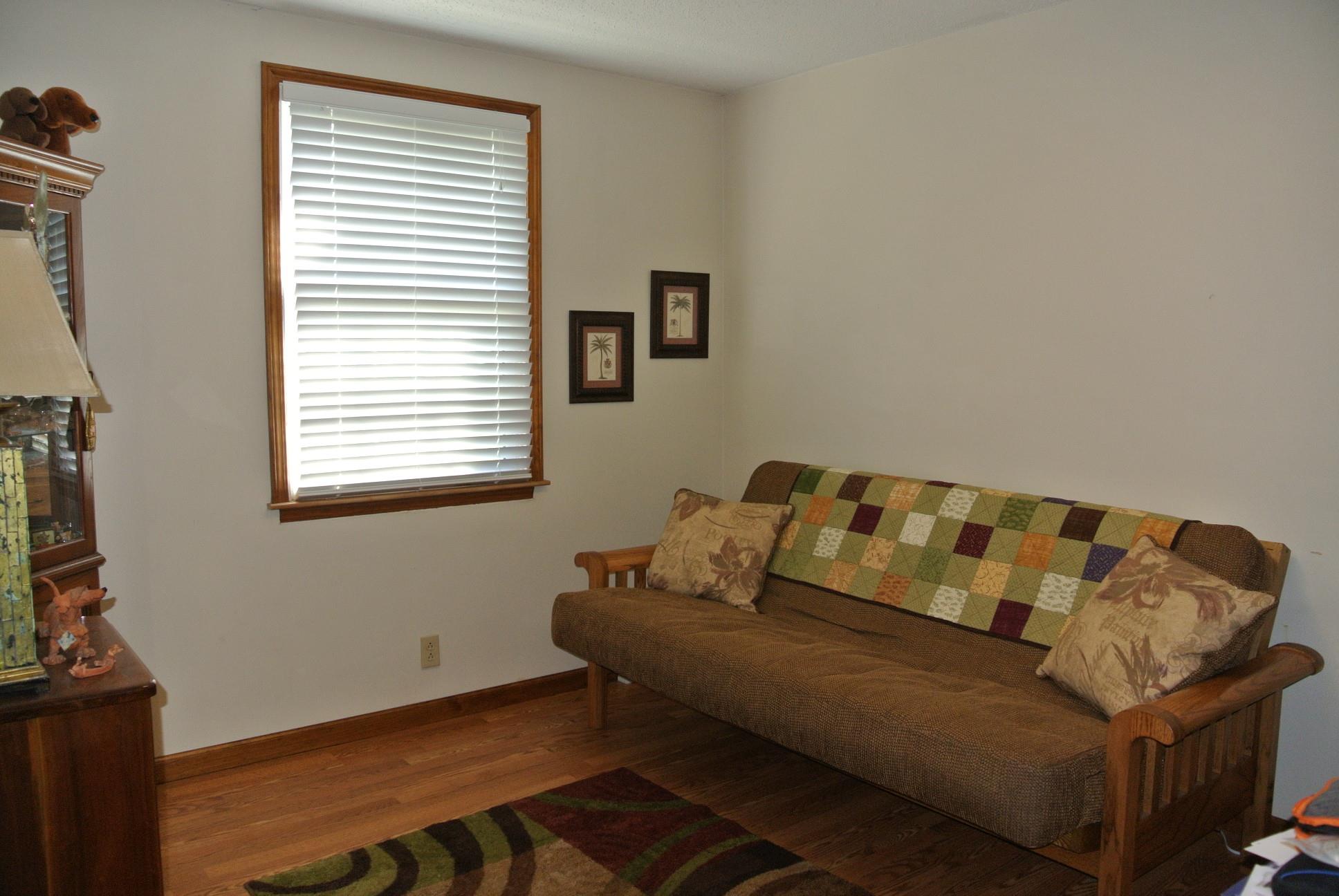 308 Dean Road Clarksville, TN 37040 - Photo 10 of 18 a living room with furniture and a window