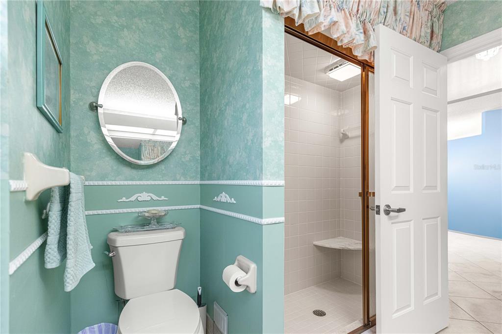 8145 Southwest 109th Street Ocala, FL 34481 - Photo 17 of 43 a bathroom with a toilet sink and shower