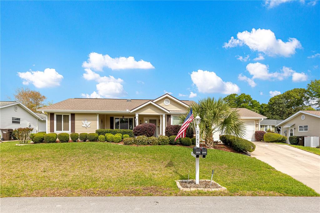 8145 Southwest 109th Street Ocala, FL 34481 - Photo 38 of 43 a front view of a house with garden