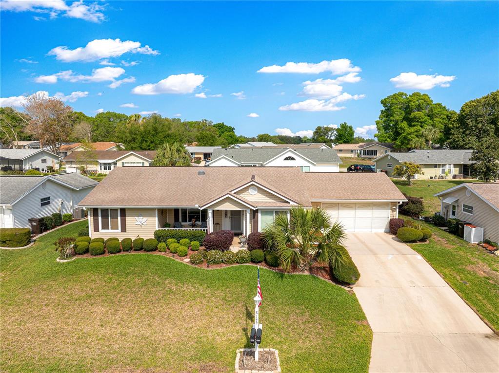 8145 Southwest 109th Street Ocala, FL 34481 - Photo 41 of 43 a aerial view of a house with swimming pool a yard and outdoor seating