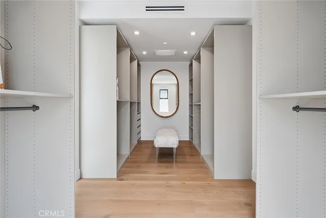 a view of an entryway with wooden floor
