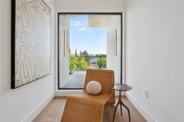 a room with furniture and a window