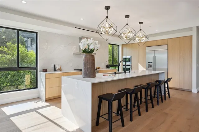 a view of a dining room and chandelier