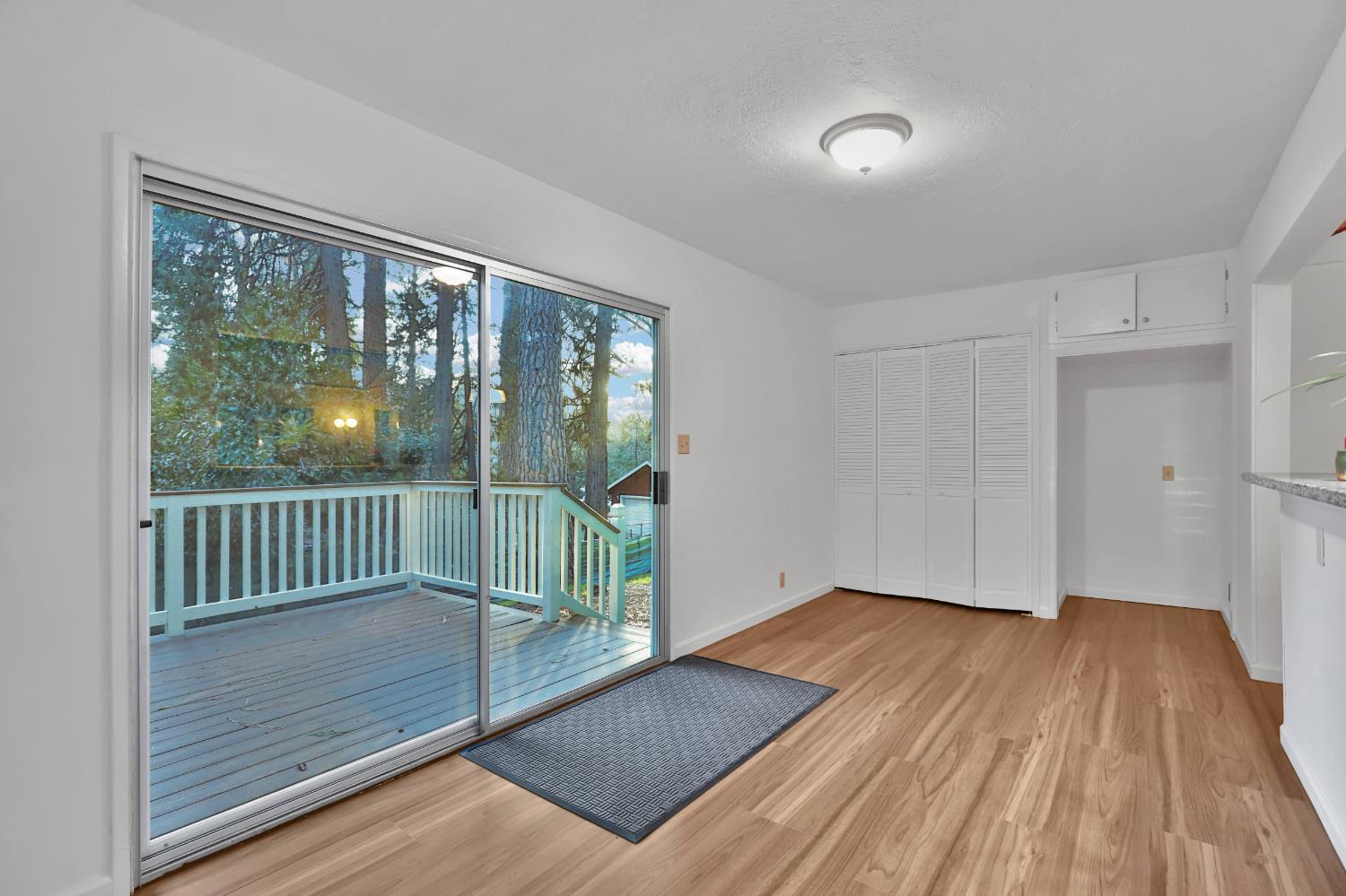 3060 Leaf Circle Pollock Pines, CA 95726 - Photo 14 of 38 a view of a room with wooden floor and balcony