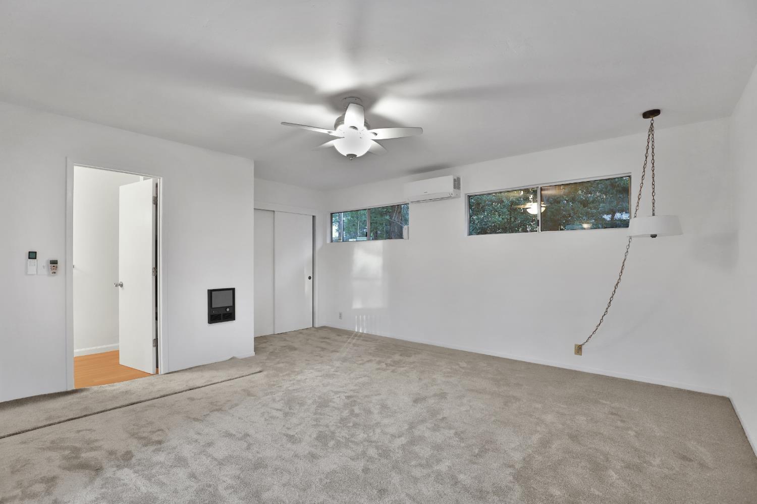 3060 Leaf Circle Pollock Pines, CA 95726 - Photo 16 of 38 wooden floor in an empty room with a window