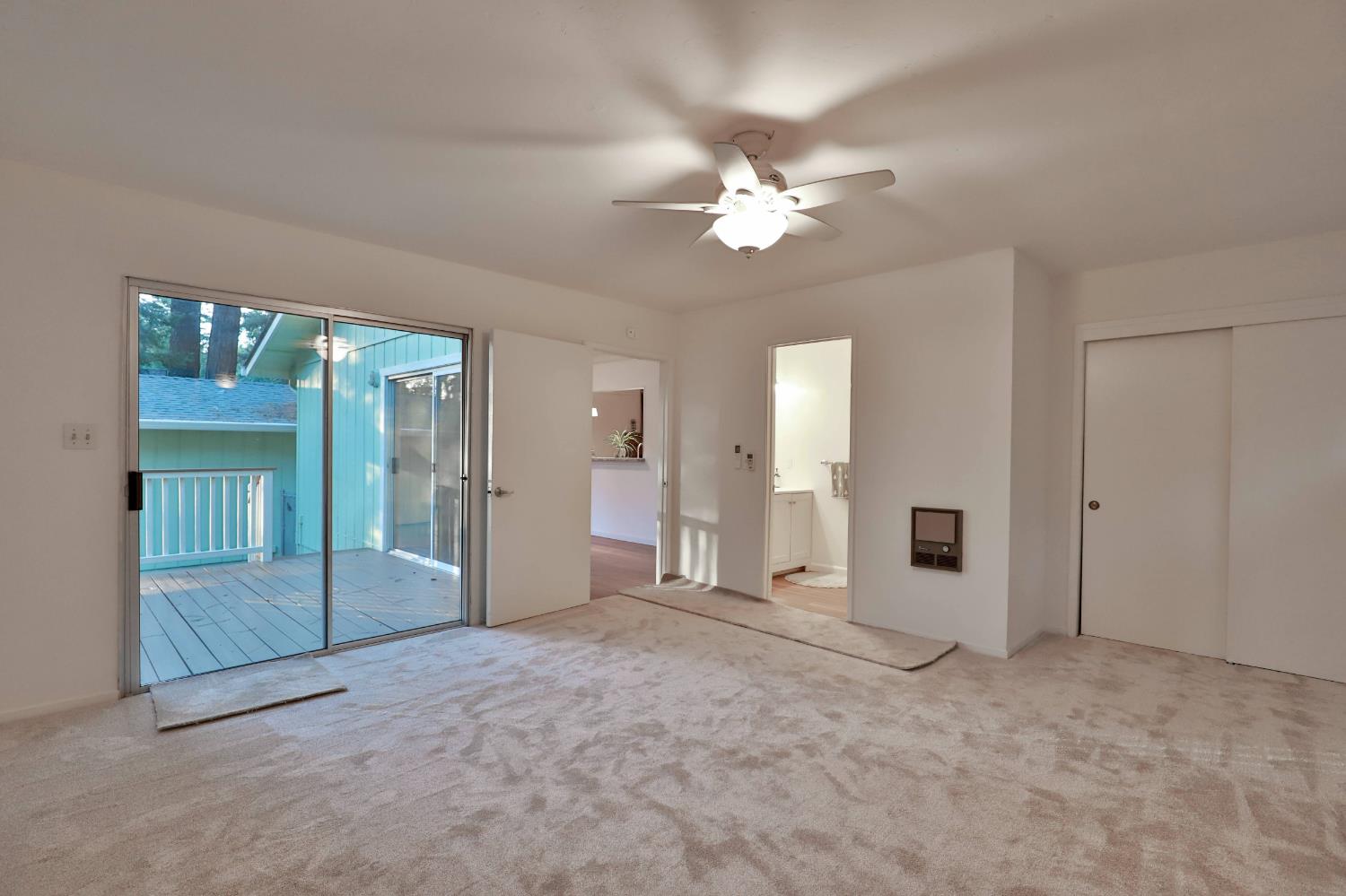 3060 Leaf Circle Pollock Pines, CA 95726 - Photo 17 of 38 an empty room with fan and windows