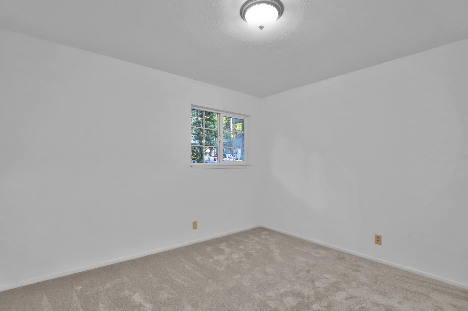 3060 Leaf Circle Pollock Pines, CA 95726 - Photo 22 of 38 an empty room with windows