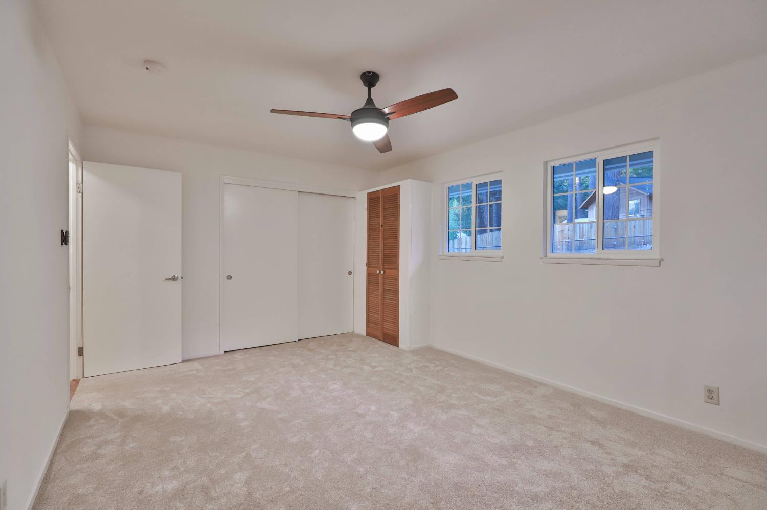 3060 Leaf Circle Pollock Pines, CA 95726 - Photo 25 of 38 a view of an empty room with a ceiling fan