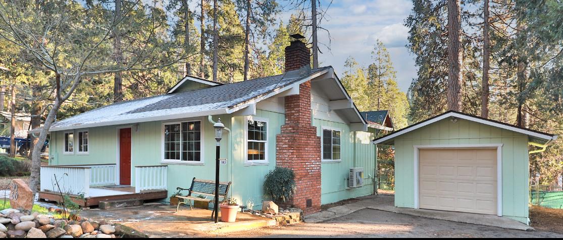 3060 Leaf Circle Pollock Pines, CA 95726 - Photo 38 of 38 a front view of a house with a tree