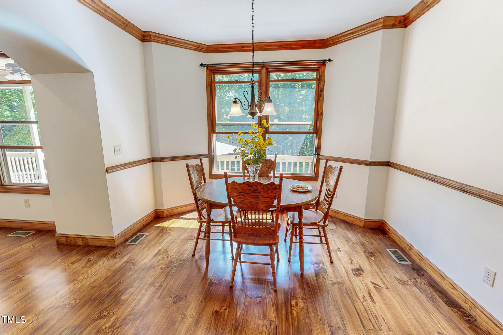 576 Duncan Road Timberlake, NC 27583 - Photo 16 of 91 a view of a dining room with furniture window and wooden floor
