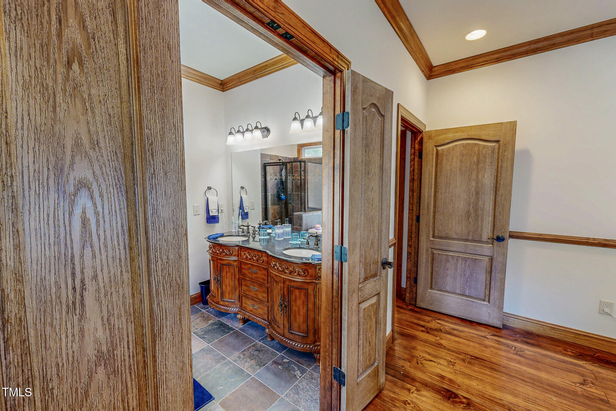 576 Duncan Road Timberlake, NC 27583 - Photo 23 of 91 a kitchen with stainless steel appliances granite countertop a refrigerator and a stove