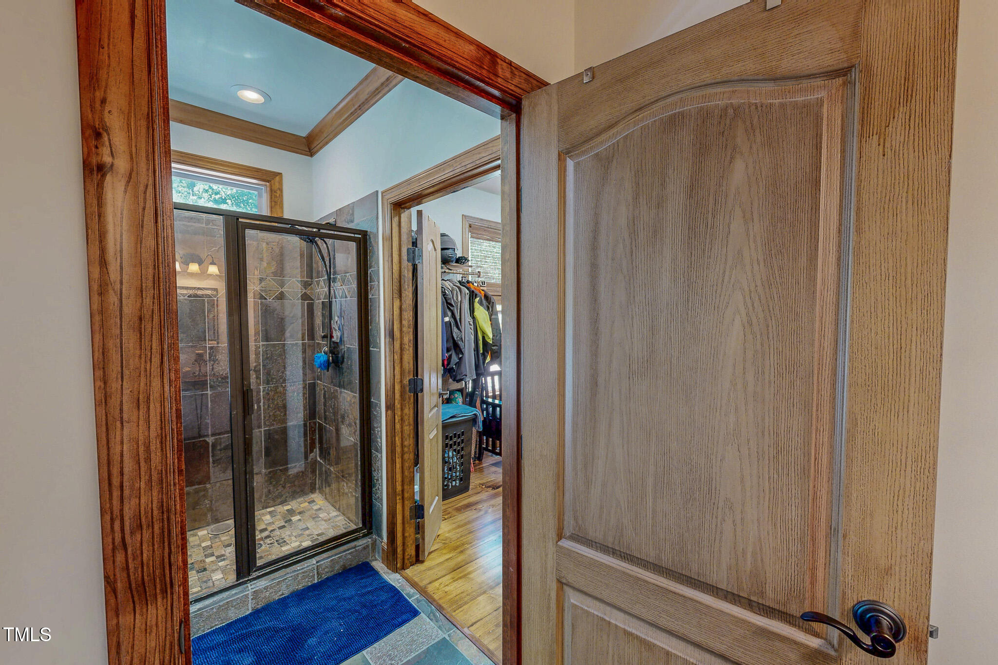 576 Duncan Road Timberlake, NC 27583 - Photo 30 of 91 a view of a hallway with wooden floor and staircase