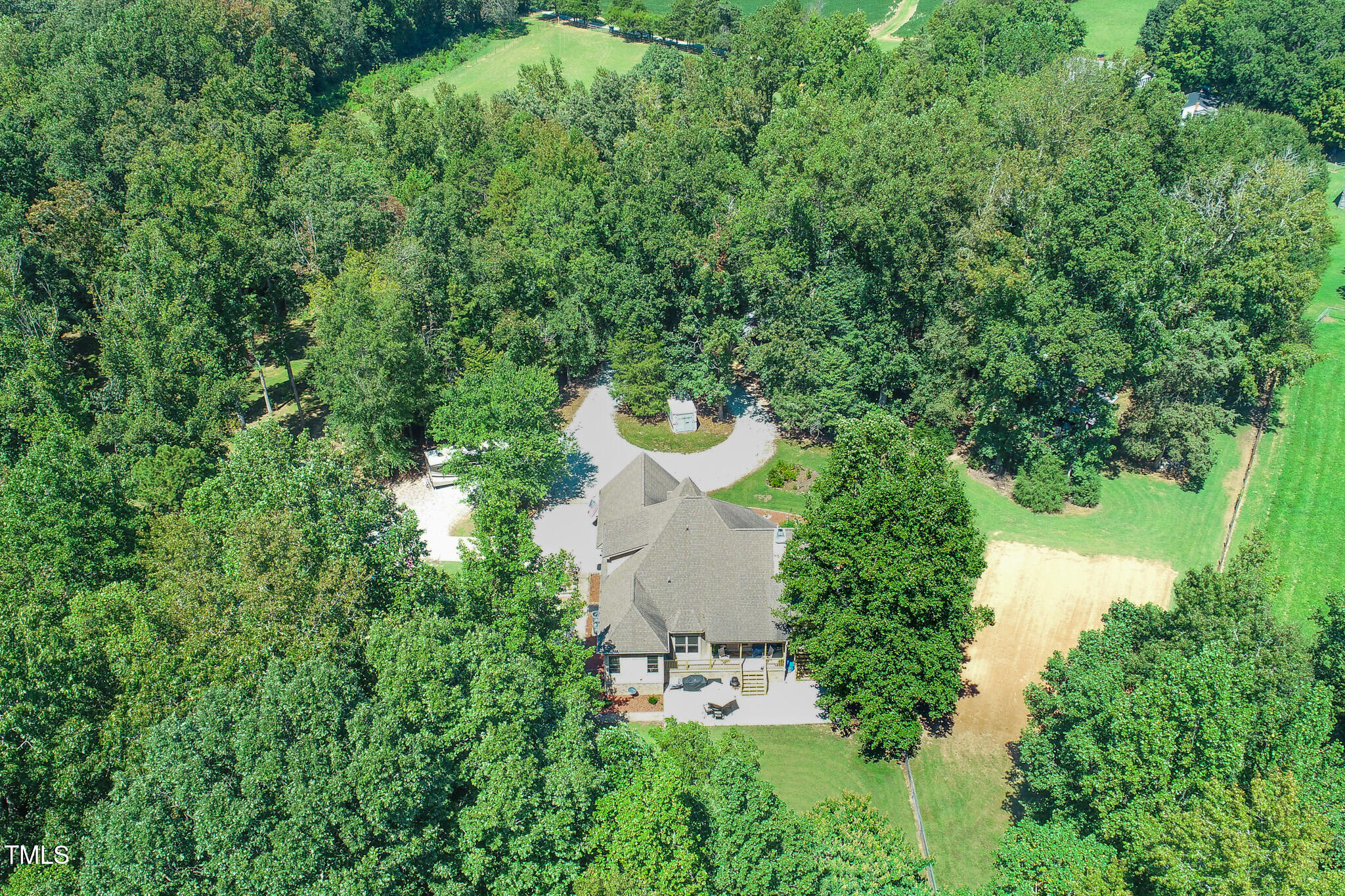 576 Duncan Road Timberlake, NC 27583 - Photo 45 of 91 an aerial view of a house with yard and outdoor seating