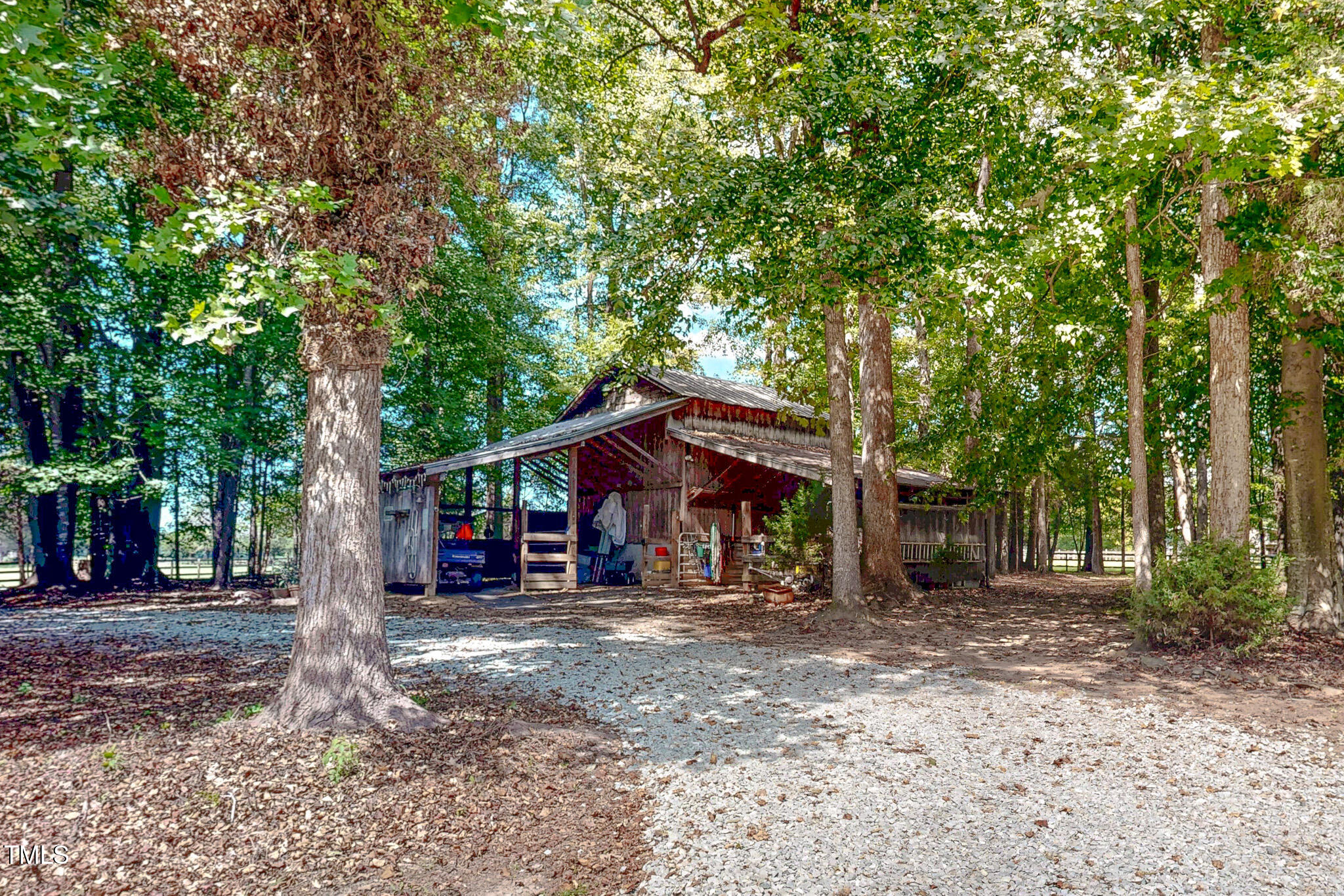 576 Duncan Road Timberlake, NC 27583 - Photo 50 of 91 a view of a trees in the middle of a yard