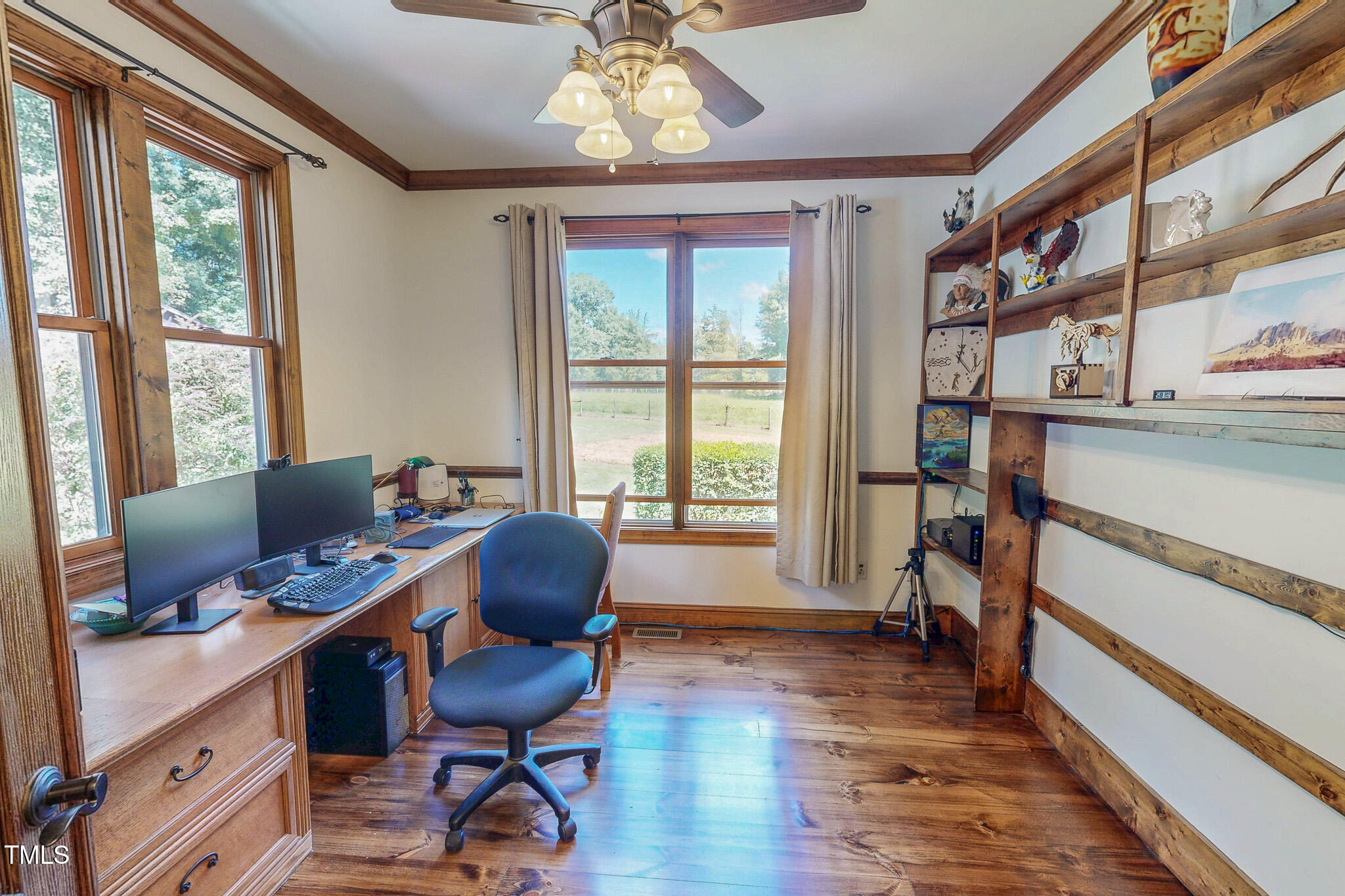 576 Duncan Road Timberlake, NC 27583 - Photo 56 of 91 a view of a livingroom with workspace and a window