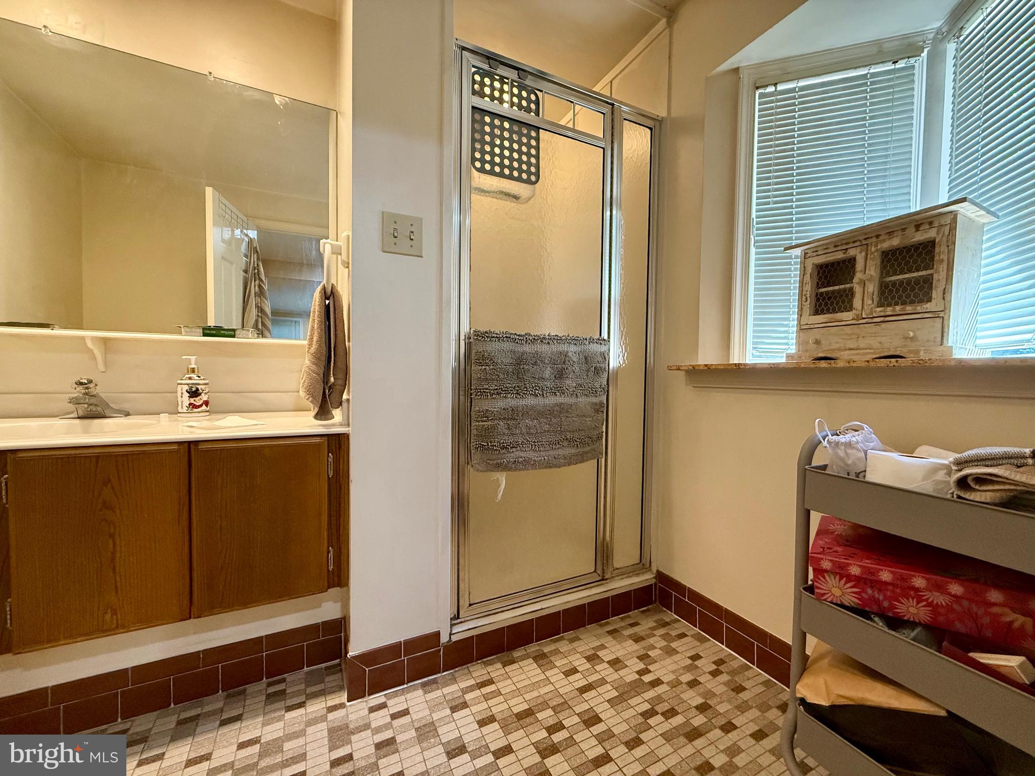 110 Partree Road Cherry Hill, NJ 08003 - Photo 17 of 33 a bathroom with a sink and a mirror