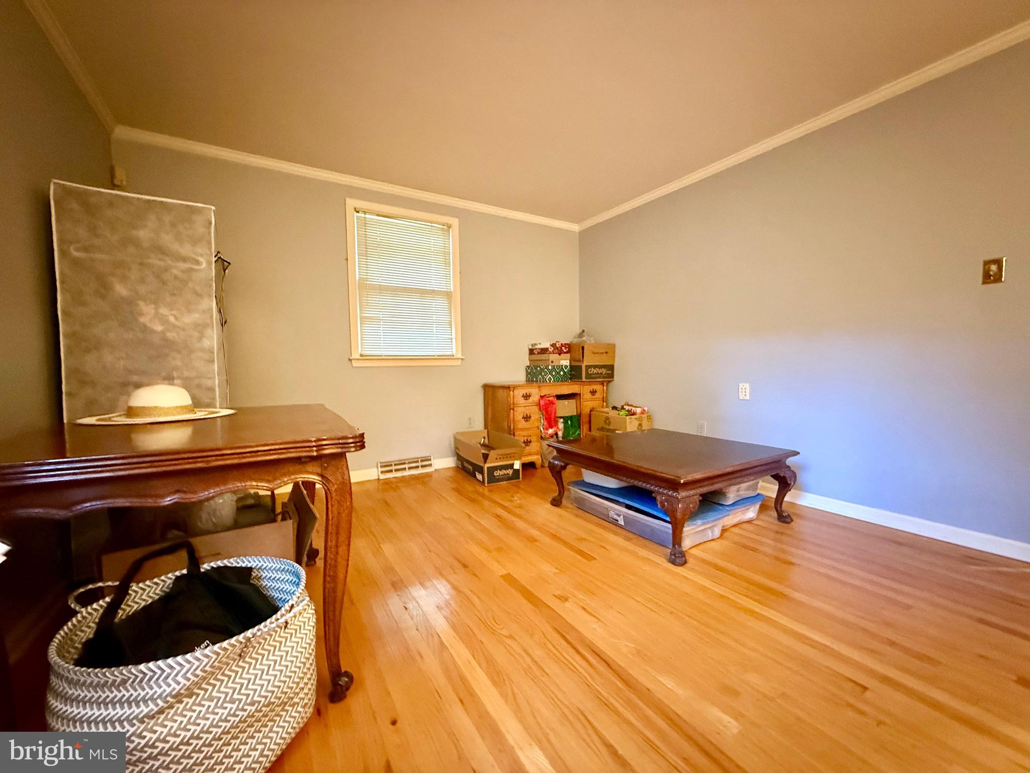 110 Partree Road Cherry Hill, NJ 08003 - Photo 18 of 33 a living room with furniture a rug and a window