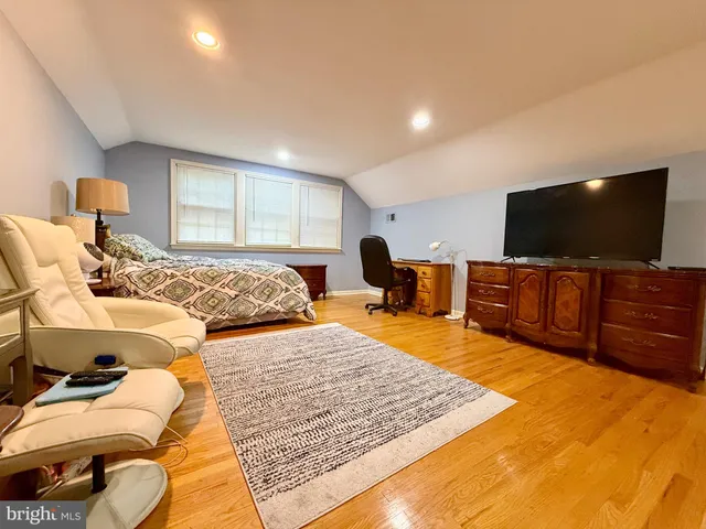 a bed room with a bed and furniture