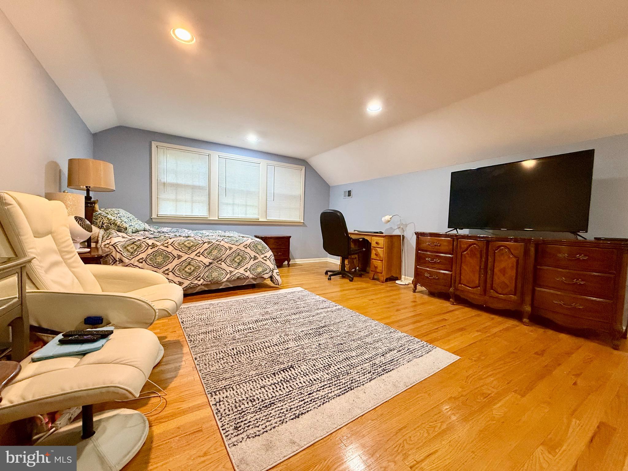 110 Partree Road Cherry Hill, NJ 08003 - Photo 20 of 33 a bedroom with a bed and a flat screen television