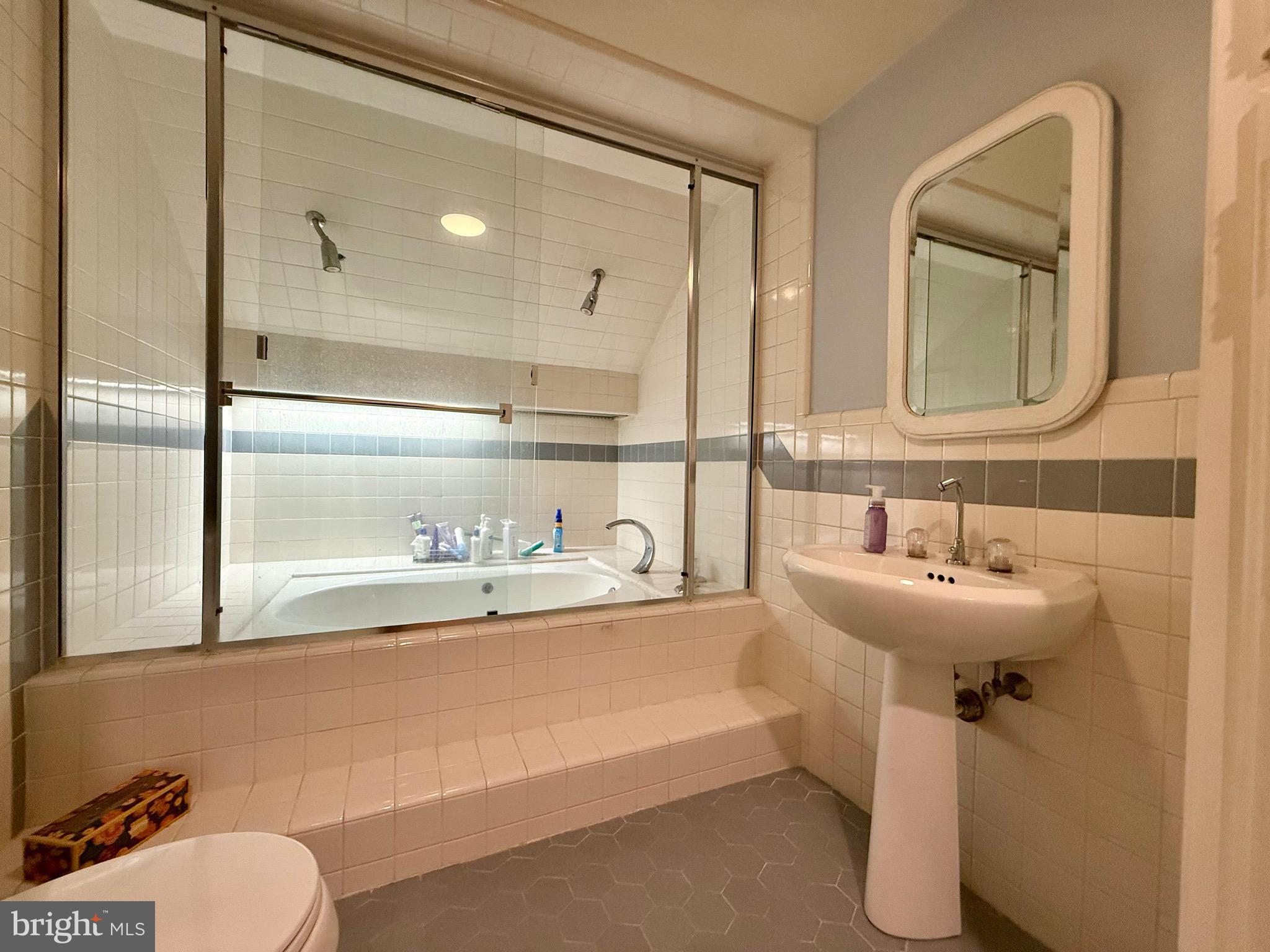 110 Partree Road Cherry Hill, NJ 08003 - Photo 22 of 33 a bathroom with a sink a toilet and a mirror