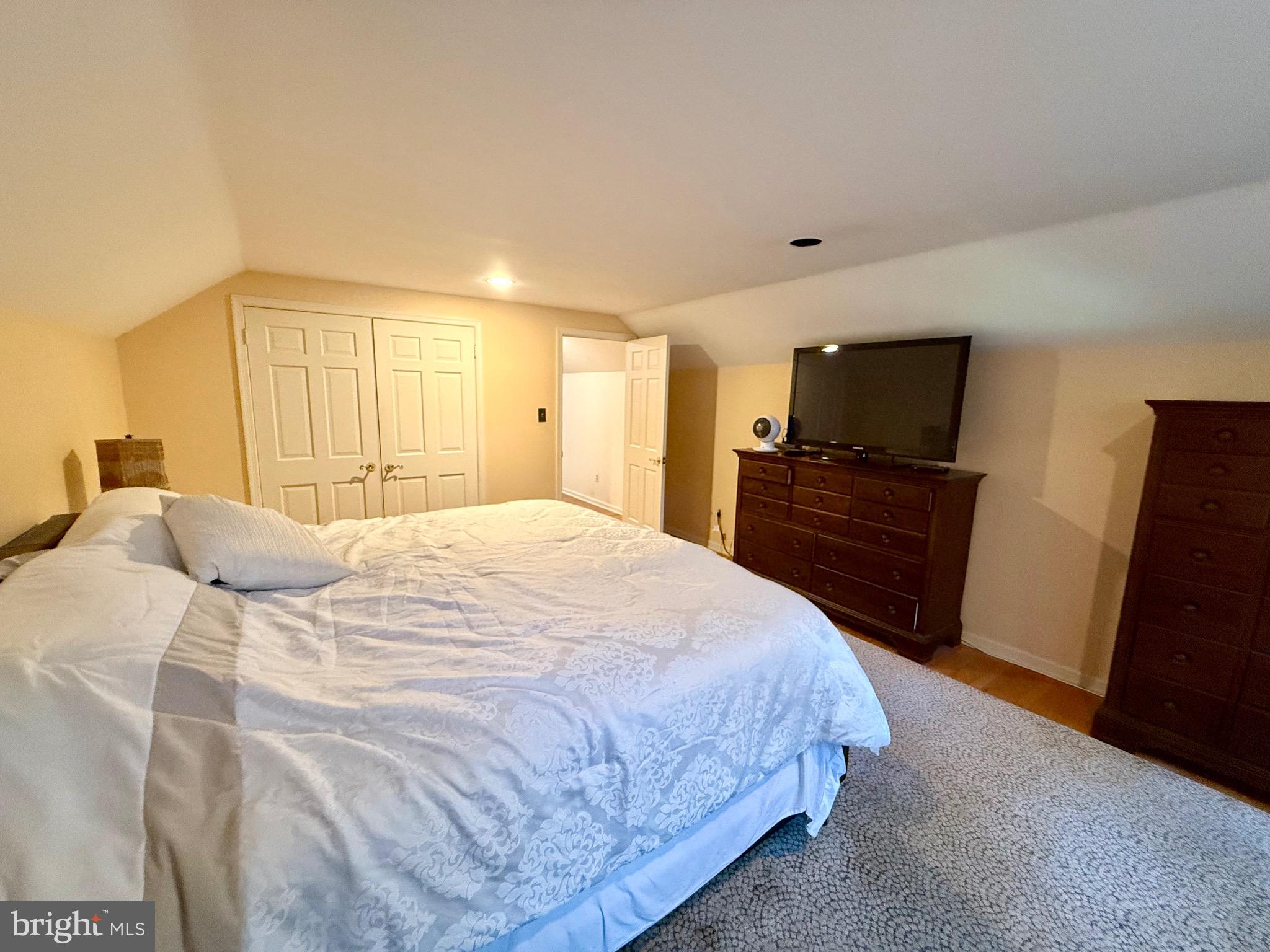 110 Partree Road Cherry Hill, NJ 08003 - Photo 24 of 33 a bedroom with a bed and a flat screen television