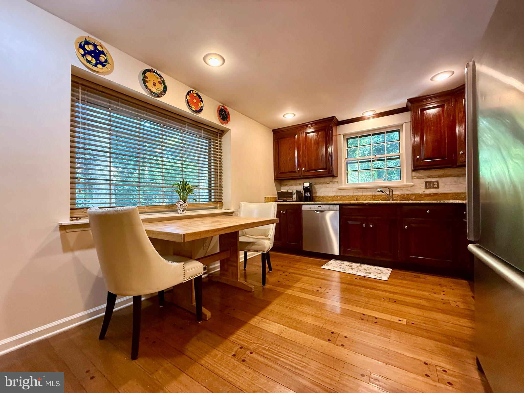 110 Partree Road Cherry Hill, NJ 08003 - Photo 4 of 33 a kitchen with granite countertop a stove a sink and a refrigerator
