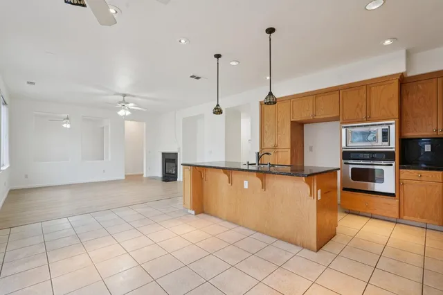 a view of hallway with wooden floor