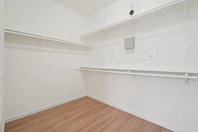 a backyard of a house with garden and patio