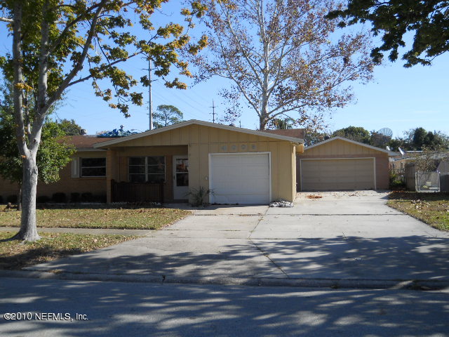 4005 Dayrl Road Jacksonville, FL 32207 - Photo 1 of 14 a front view of a house with a garden