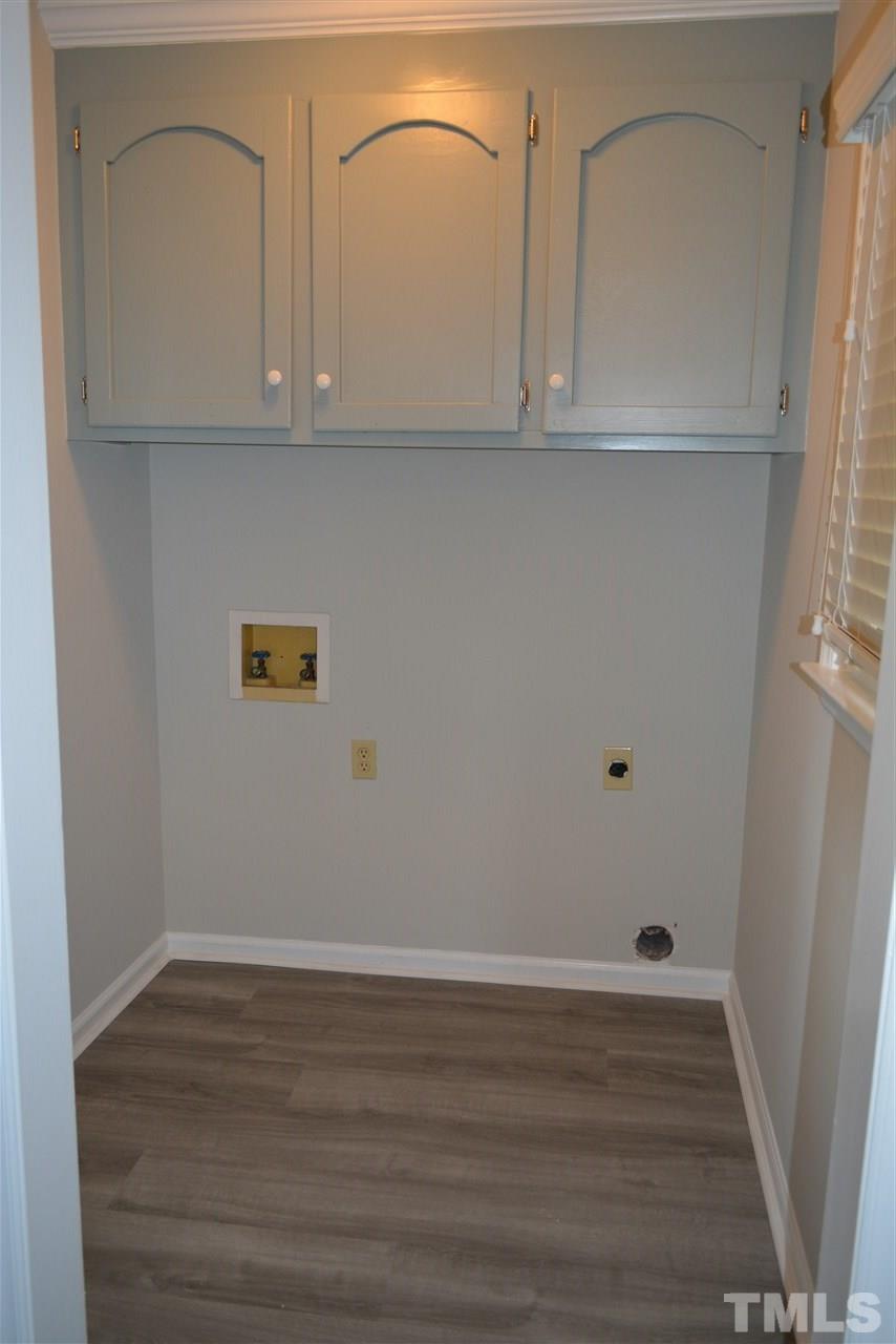 5236 Carrier Way Raleigh, NC 27603 - Photo 19 of 22 New wall paint, new trim paint, new luxury vinyl floor