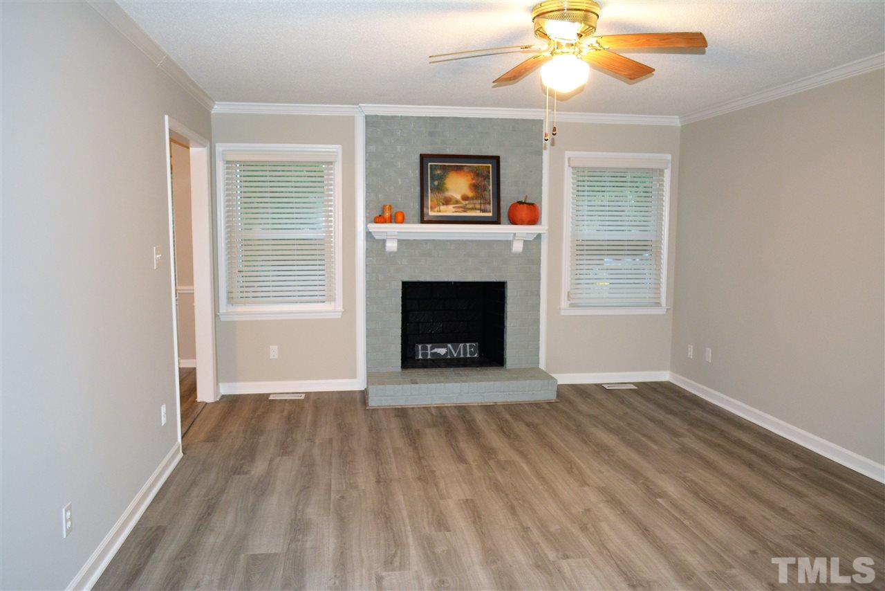 5236 Carrier Way Raleigh, NC 27603 - Photo 5 of 22 New luxury vinyl flooring, new designer paint!