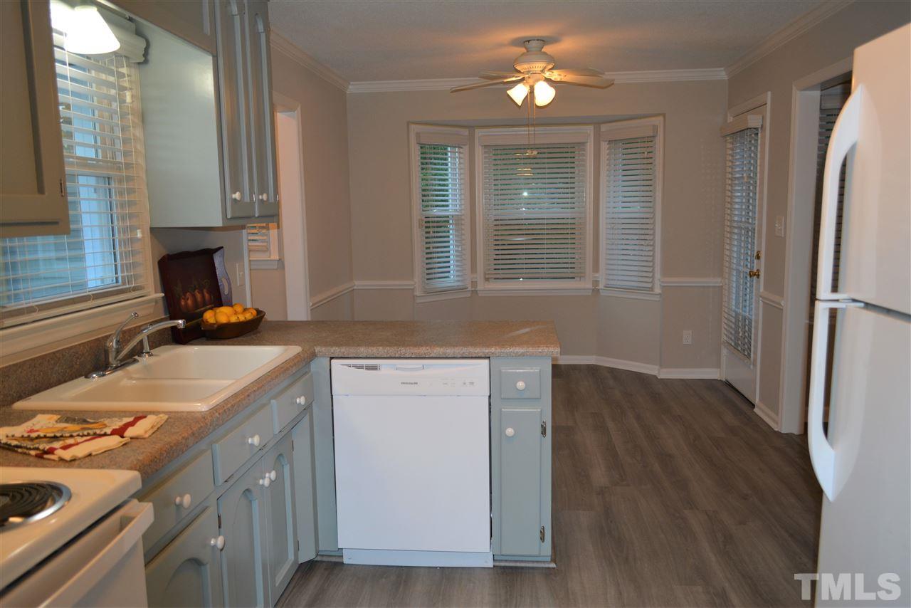 5236 Carrier Way Raleigh, NC 27603 - Photo 8 of 22 New luxury vinyl flooring too!