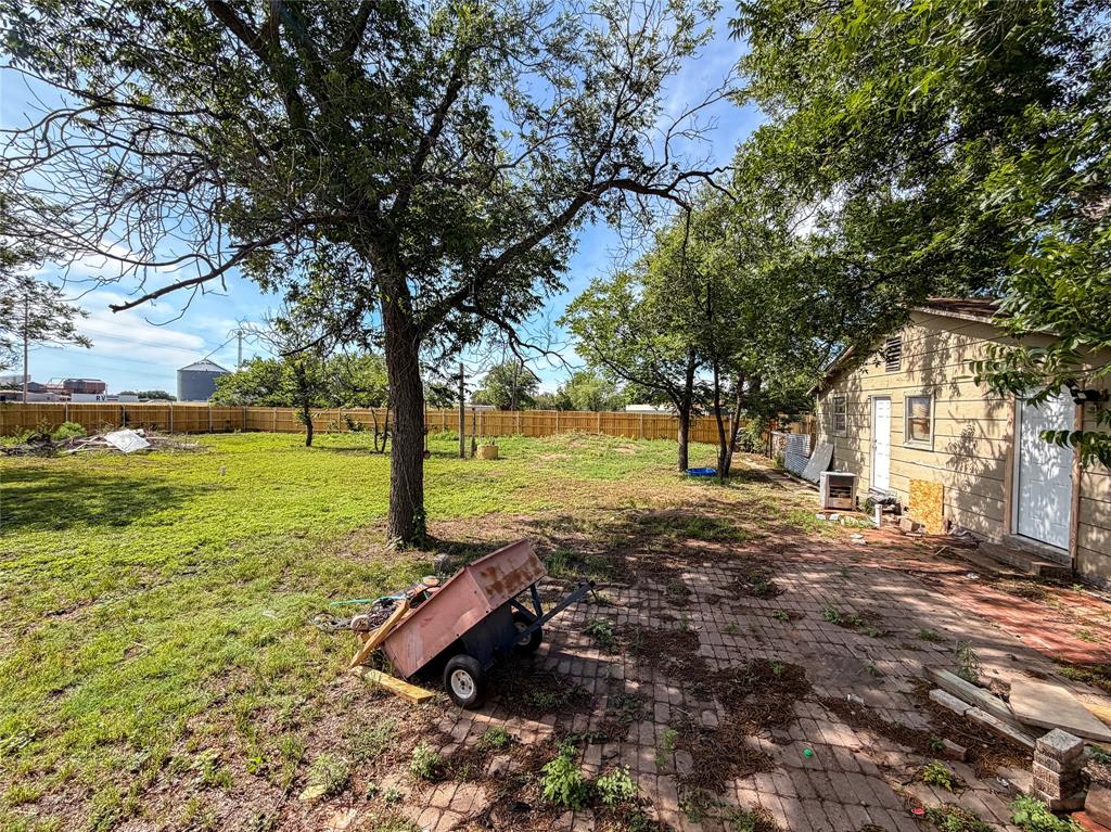 506 North Ave B Haskell, TX 79521 - Photo 13 of 13 a view of a yard with a tree