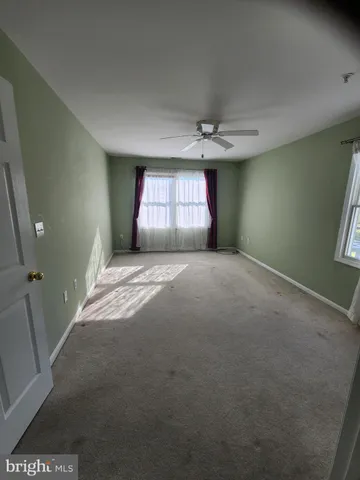 a view of a room with windows