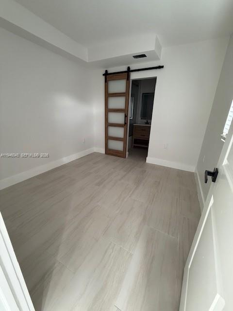 9007 Southwest 38th Street, Unit 9005 Miami, FL 33165 - Photo 1 of 7 a view of an empty room with a fireplace