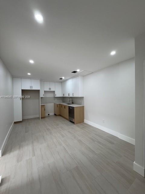 9007 Southwest 38th Street, Unit 9005 Miami, FL 33165 - Photo 5 of 7 a large kitchen with a refrigerator and a stove top oven