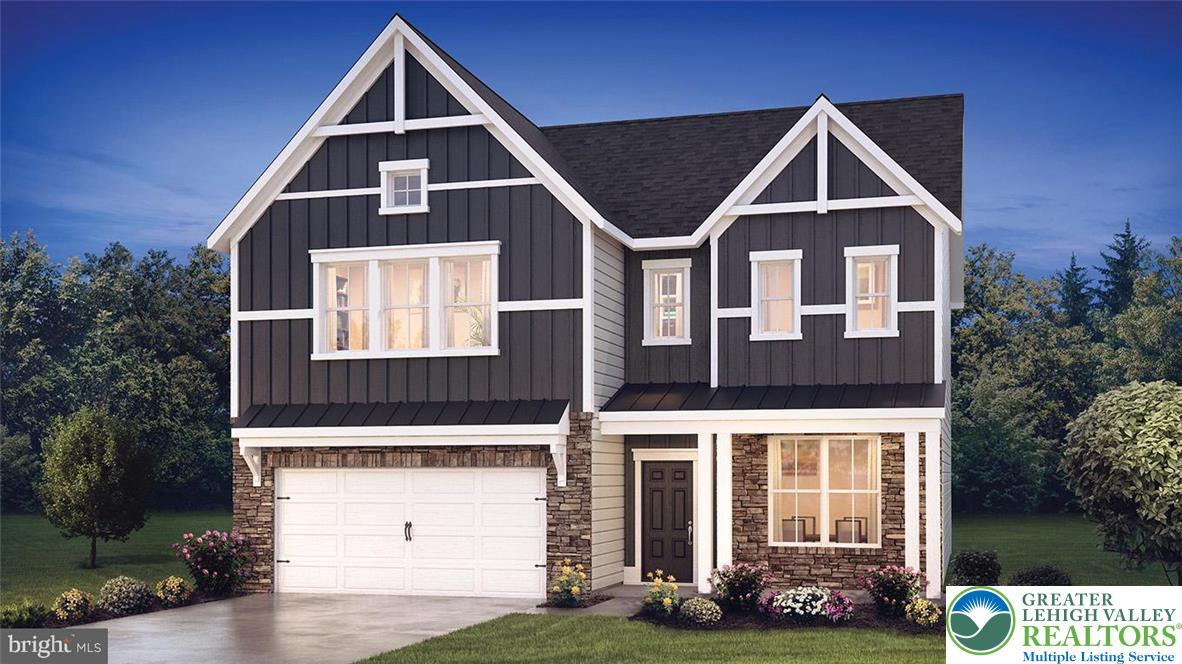 115 Winding Road Easton, PA 18040 - Photo 4 of 24 Modern craftsman-style residence with a dark facade and white trim offers inviting curb appeal.