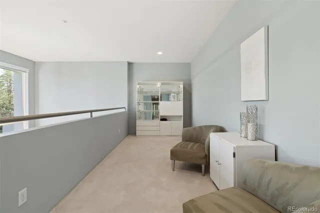 a living room with furniture and window