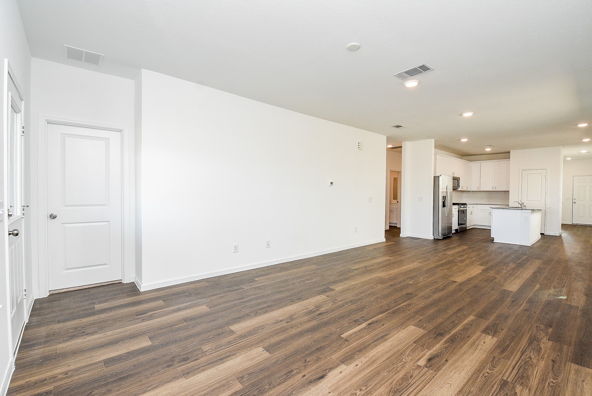 14499 Cedar Br Lane Conroe, TX 77302 - Photo 18 of 32 a view of a kitchen from the hallway