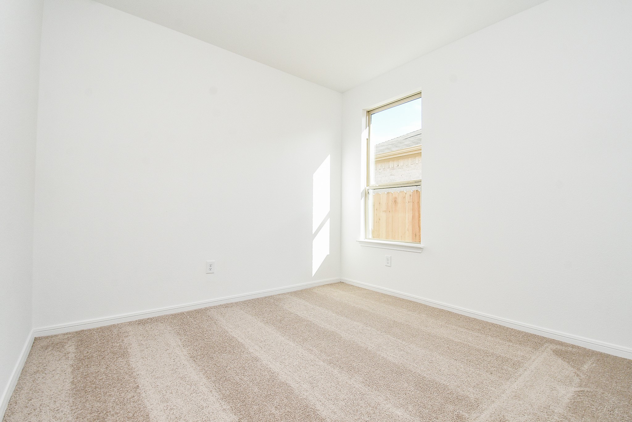 14499 Cedar Br Lane Conroe, TX 77302 - Photo 19 of 32 a view of an empty room with a window