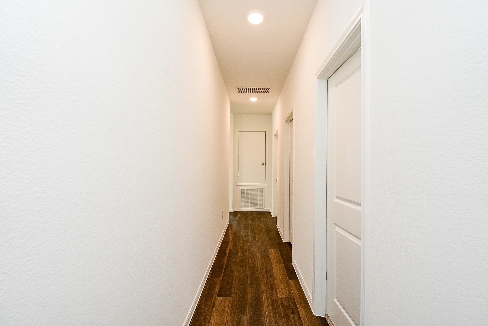 14499 Cedar Br Lane Conroe, TX 77302 - Photo 27 of 32 a view of a hallway with a white door