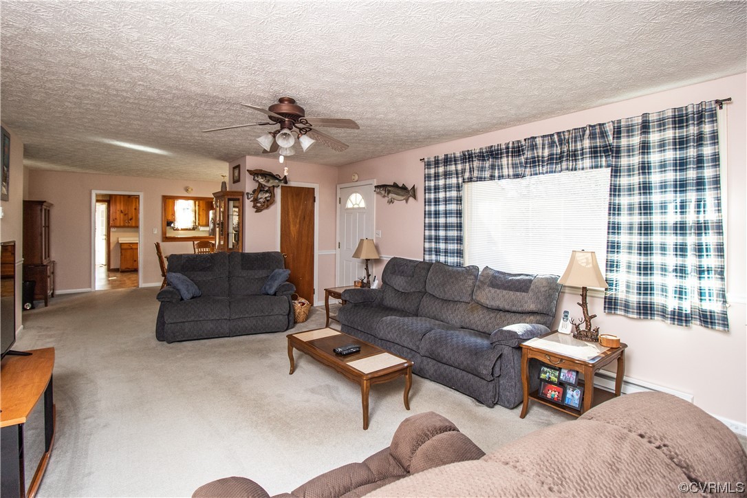 8212 Hickory Road Petersburg, VA 23803 - Photo 5 of 31 a living room with furniture and a large window