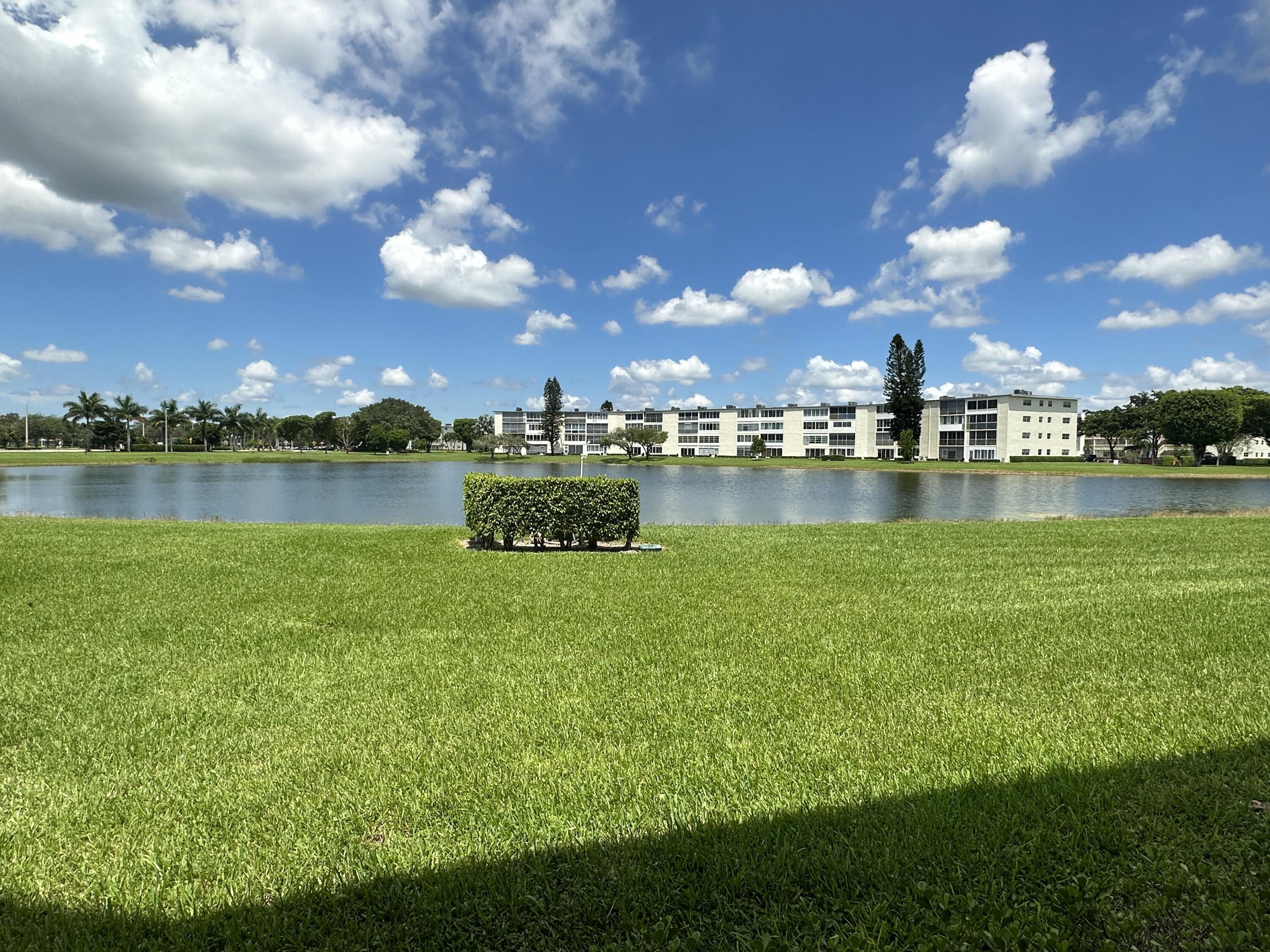1094 Cornwall East Boca Raton, FL 33434 - Photo 1 of 35 a view of a lake with houses