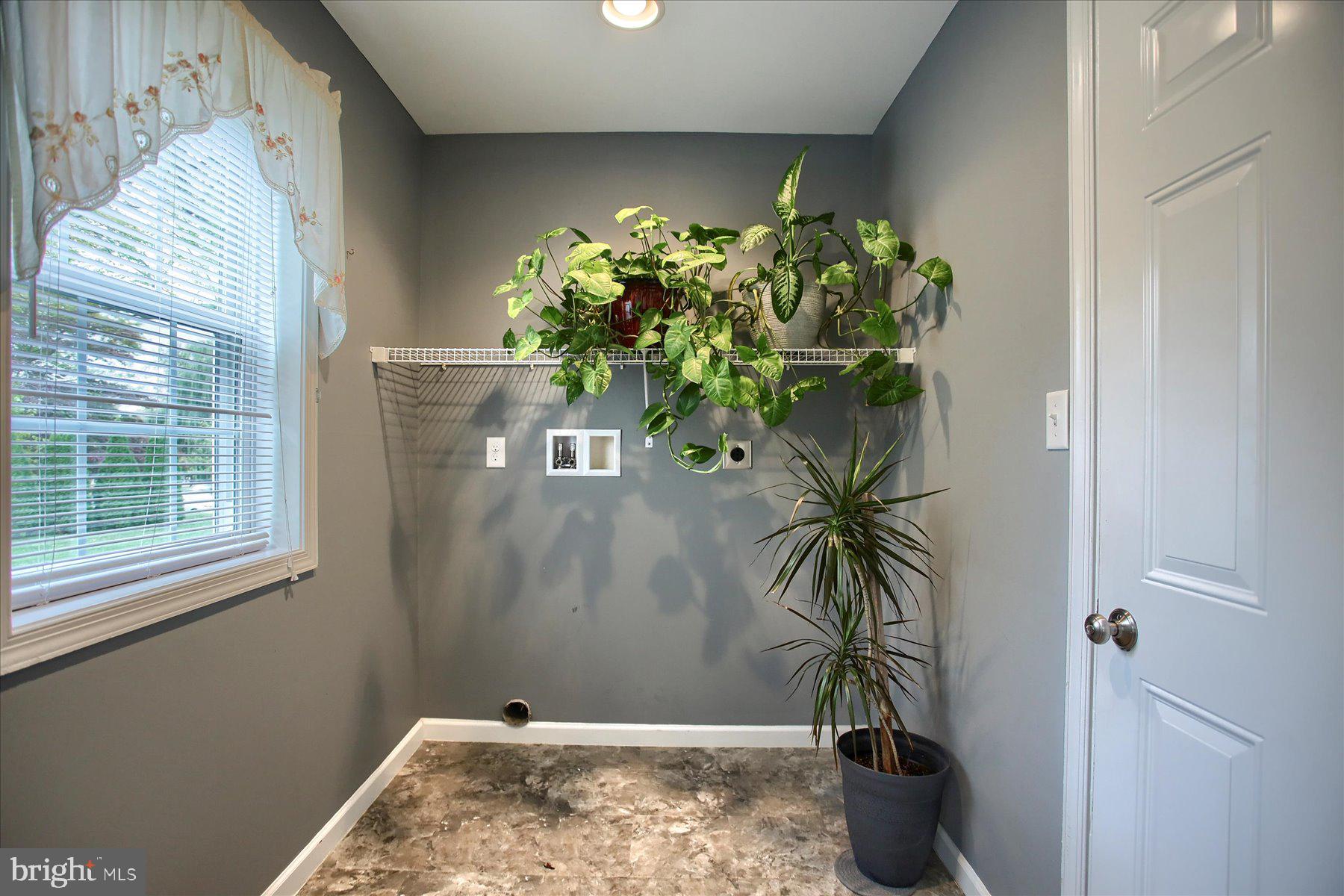 4990 Bossler Road Elizabethtown, PA 17022 - Photo 14 of 41 1st Floor Laundry between kitchen and garage